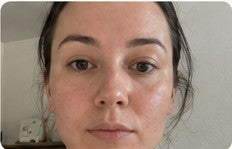 Front-facing customer result with a neutral expression